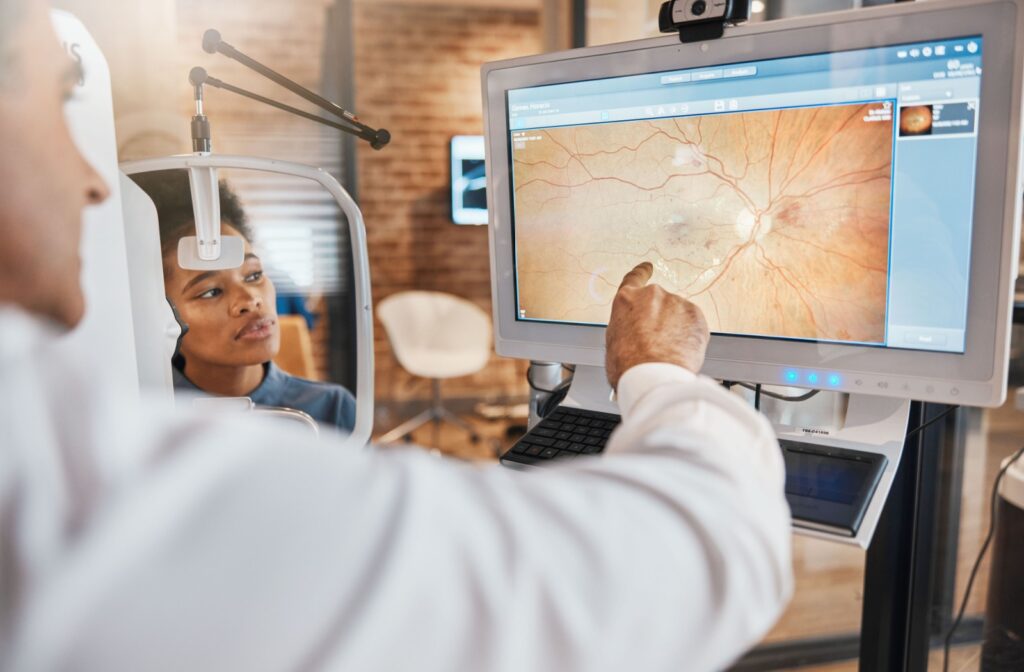 An optometrist explains the details of their patients' retinal imaging during their double vision assessment.