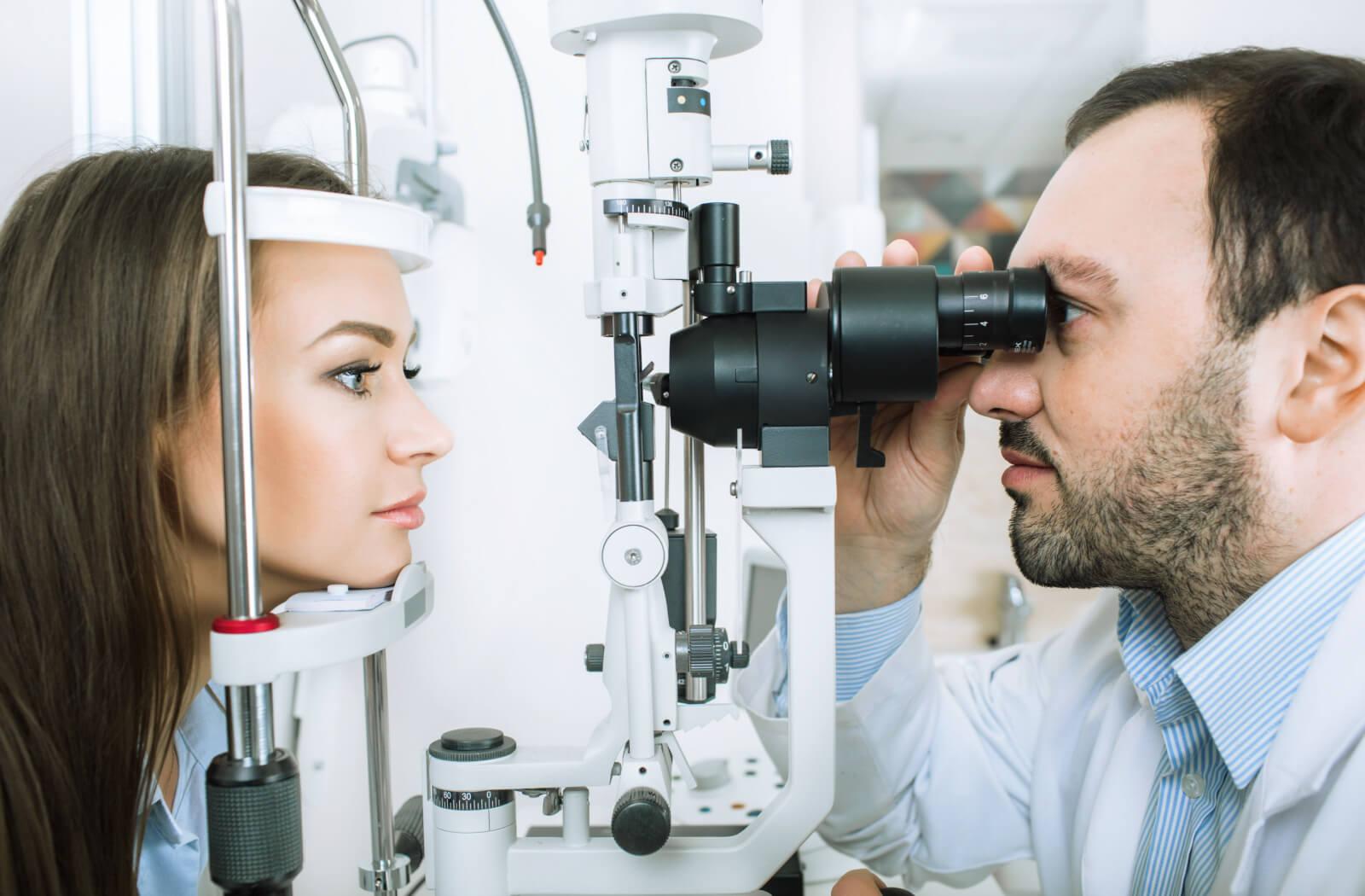 A person with watery eyes visiting an eye doctor for an eye exam.